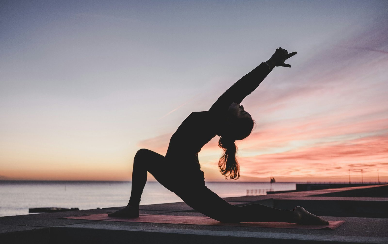 Woman practising yoga in a calm wellness setting